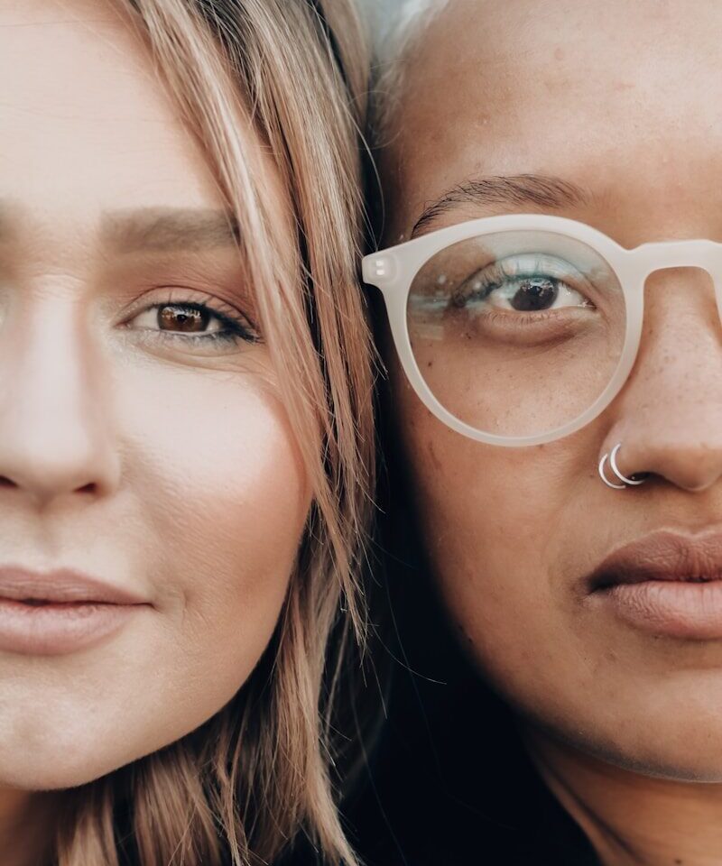 wearing white framed eyeglasses